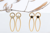 Gold statement earrings with crystals