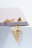 mix and match geometric jacket earringss