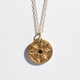 Golden coin necklace with black swarovski crystal