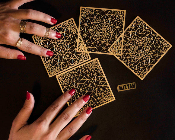 MIZYAN - a set of 4 gold plated coasters
